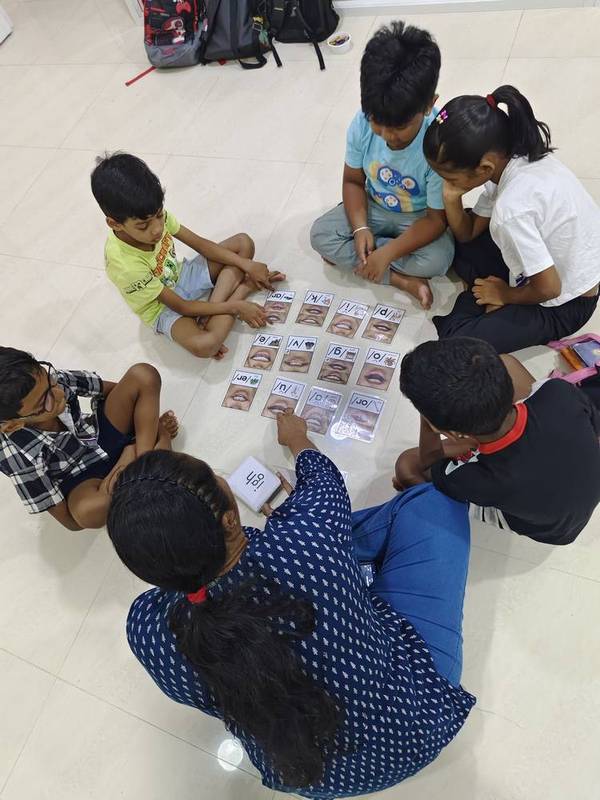 Small group class discussion at Thrive Academy